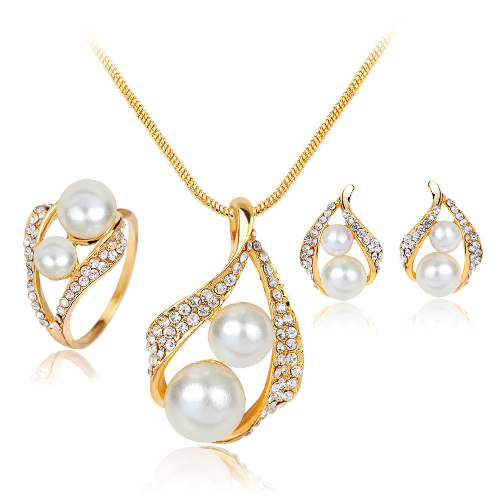Earrings Necklace Set with Ring Pearl Jewelry 3 Piece featuring elegant pearls and gold finish with floral design.