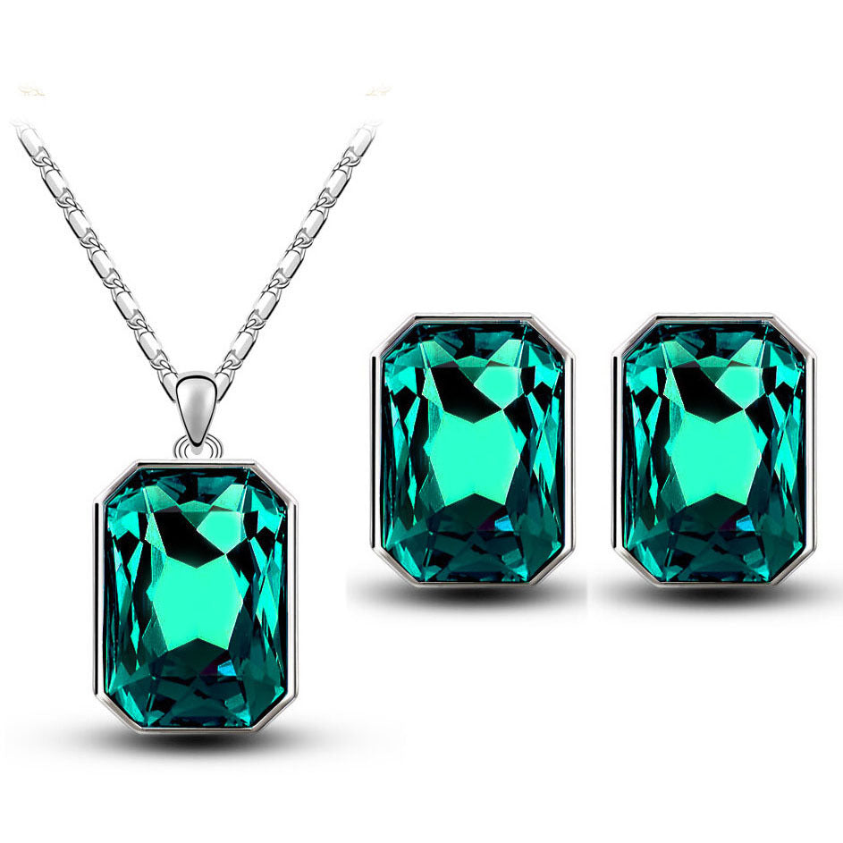 Crystal Pendant Necklace for Women elegant Statement Jewelry with matching earrings.
